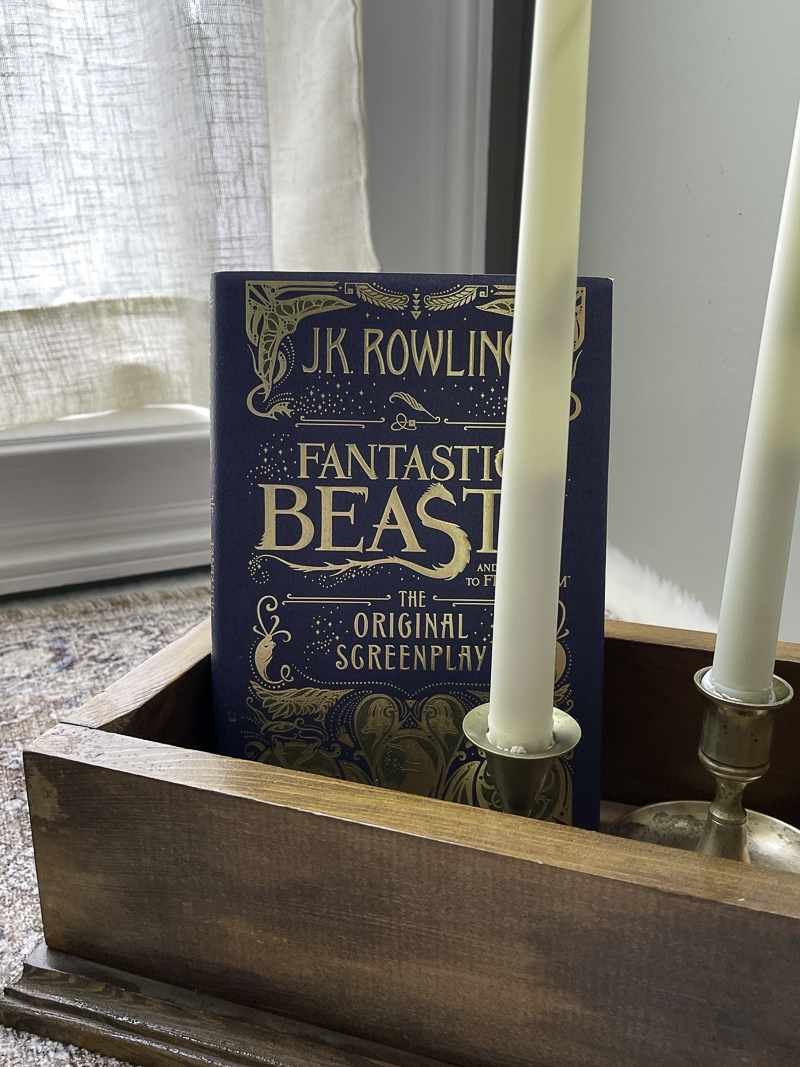 Using books and candles as decorations in a Harry Potter room