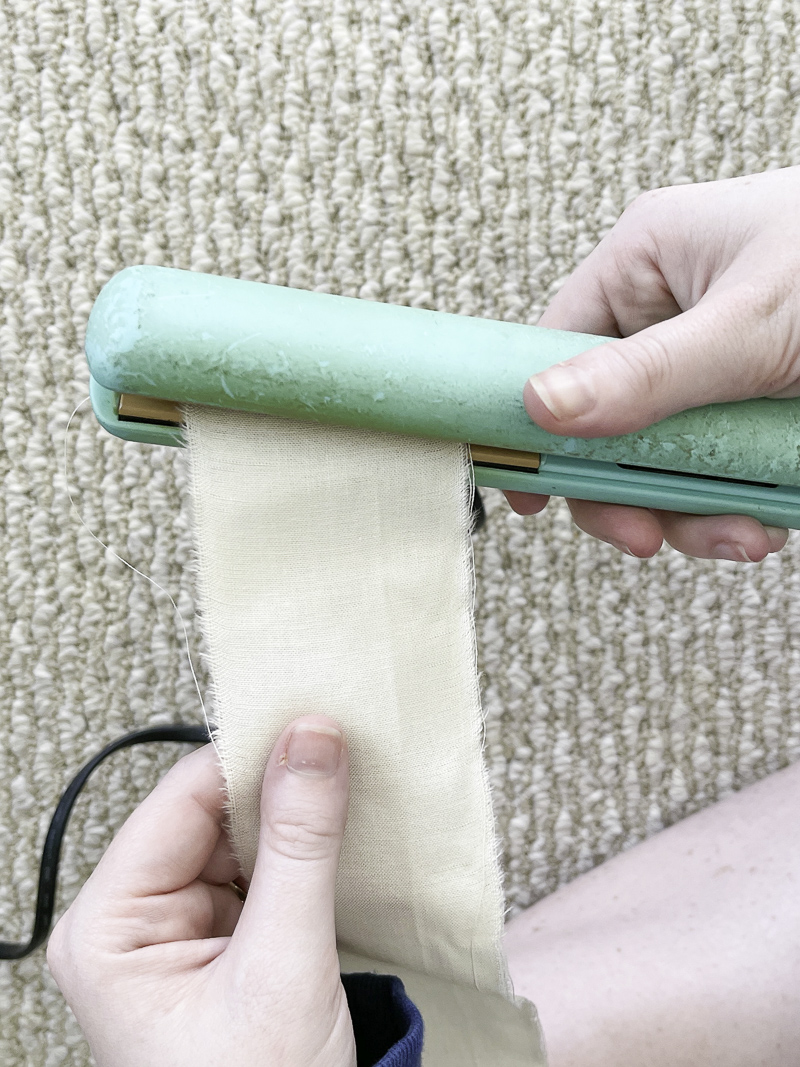 Easy way to iron fabric ribbon is with a straightening iron