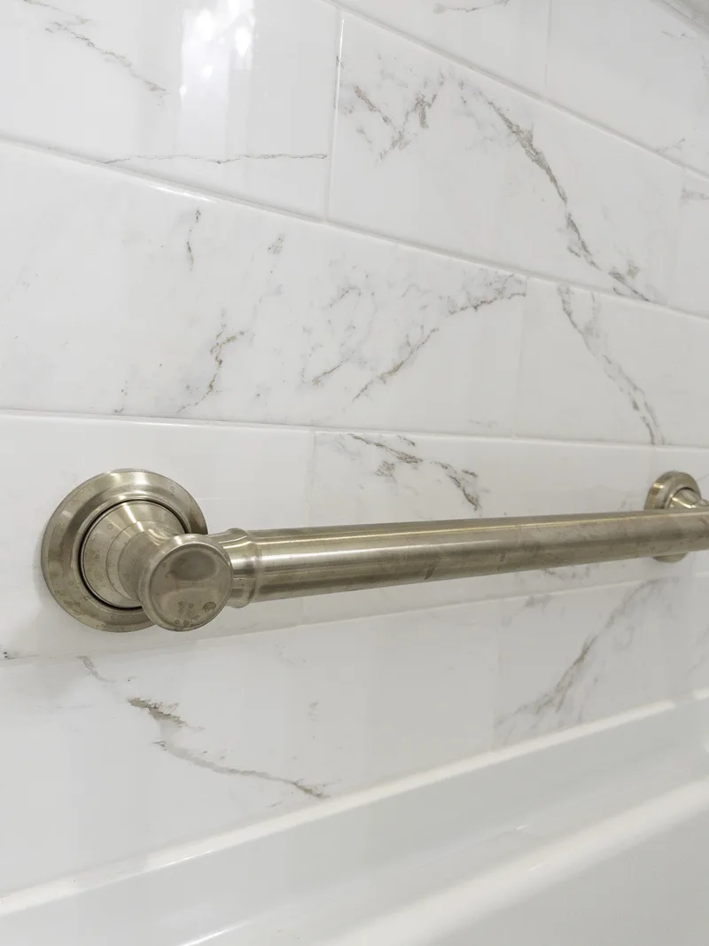 Tub handle in a guest bathroom design