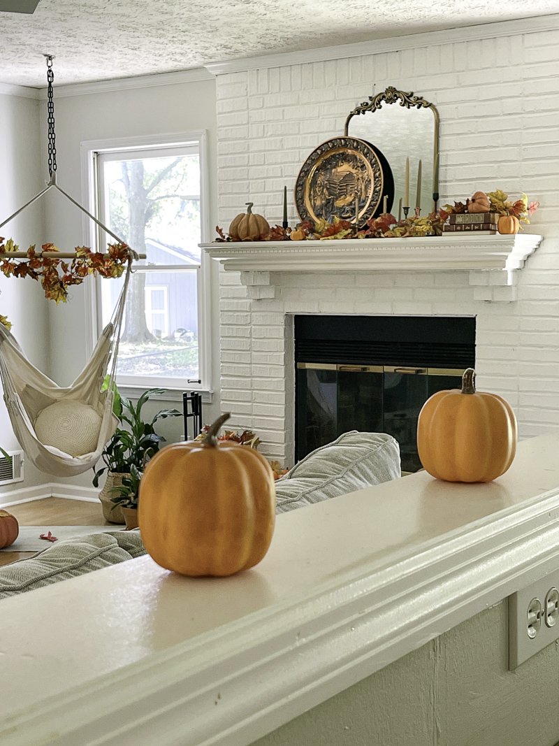 Living room decorated in copper and orange for fall