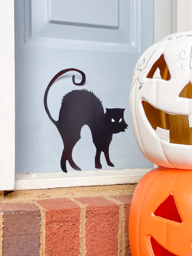 Black cat silhouette printable for halloween decorations.