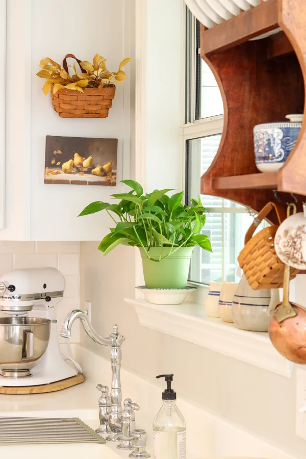 Neutral and orange fall decorations in the kitchen