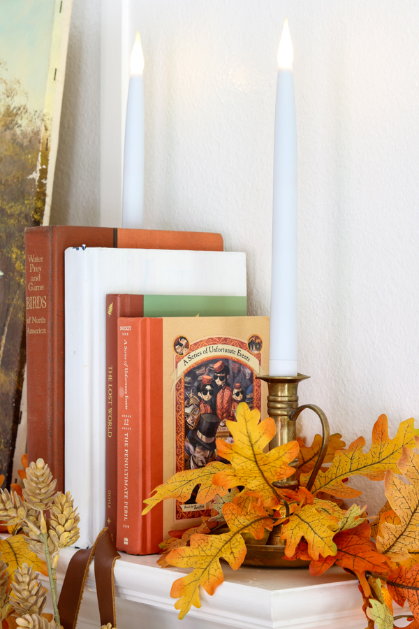 neutral and orange fall decor ideas using old books