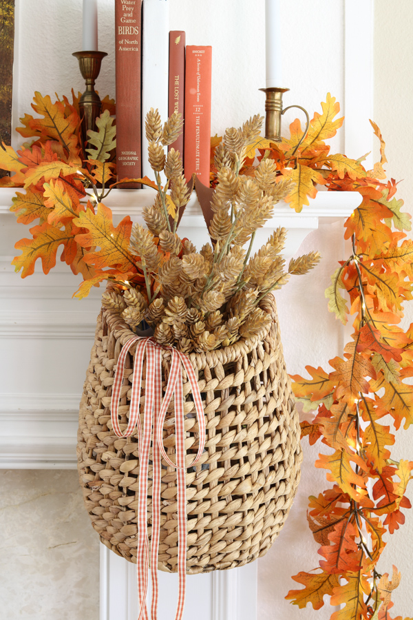 neutral and orange fall decor ideas fireplace mantel