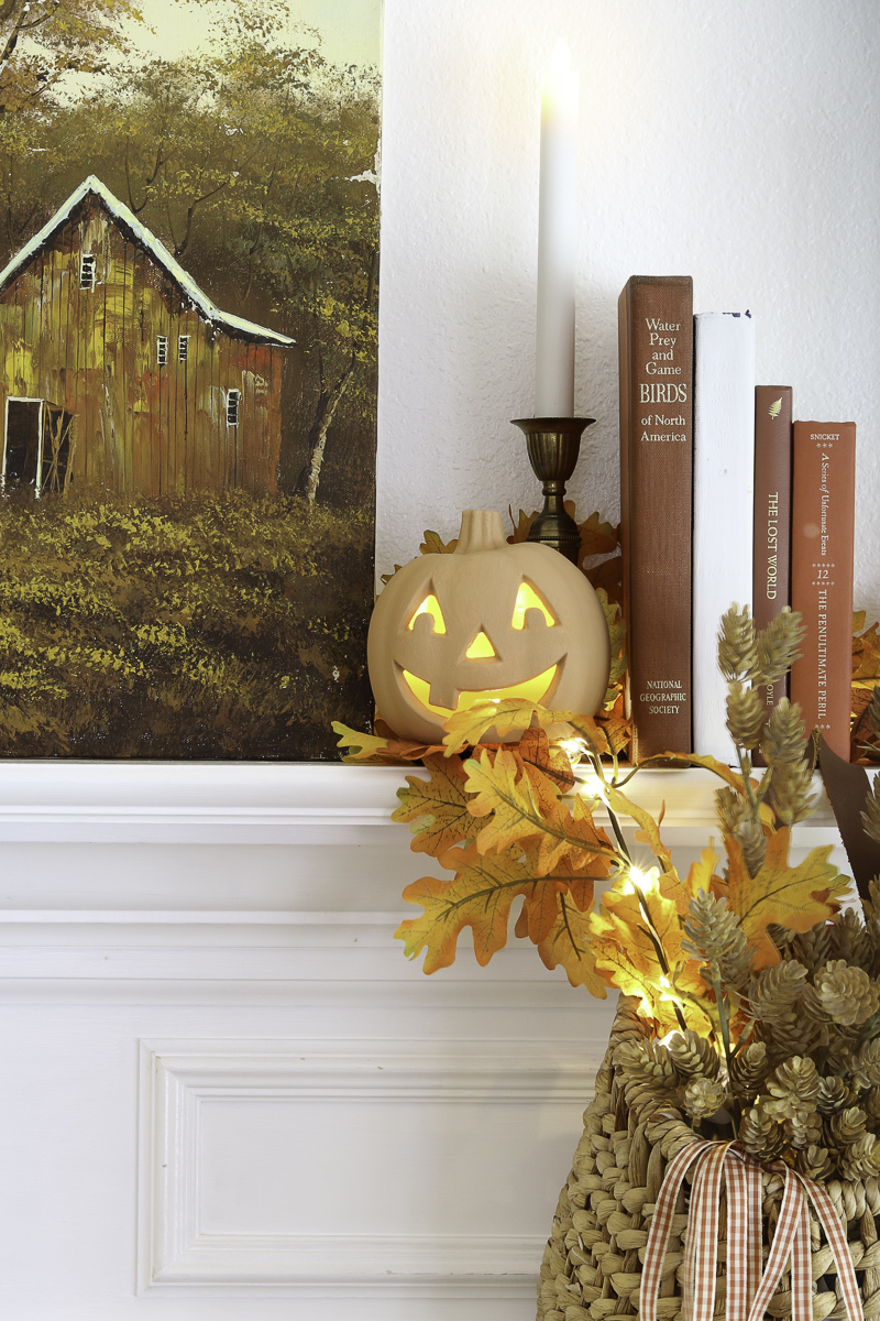 Terracotta pumpkin DIY - jack o lantern on mantel