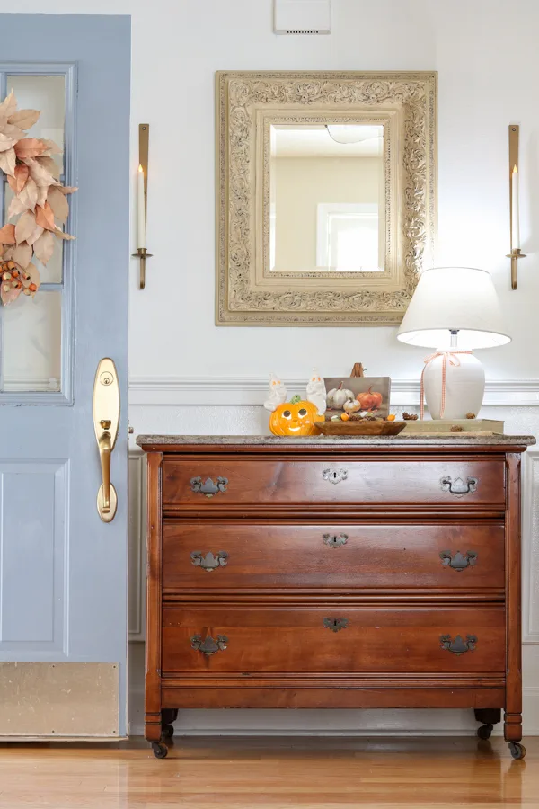 Decorating an entryway with Jack-o'-lanterns