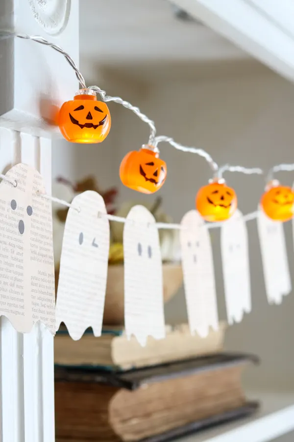 Decorating a bookcase with jack o lanterns