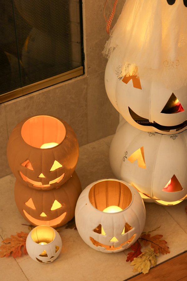 Dollar Tree battery powered candles to light jack o lanterns for halloween