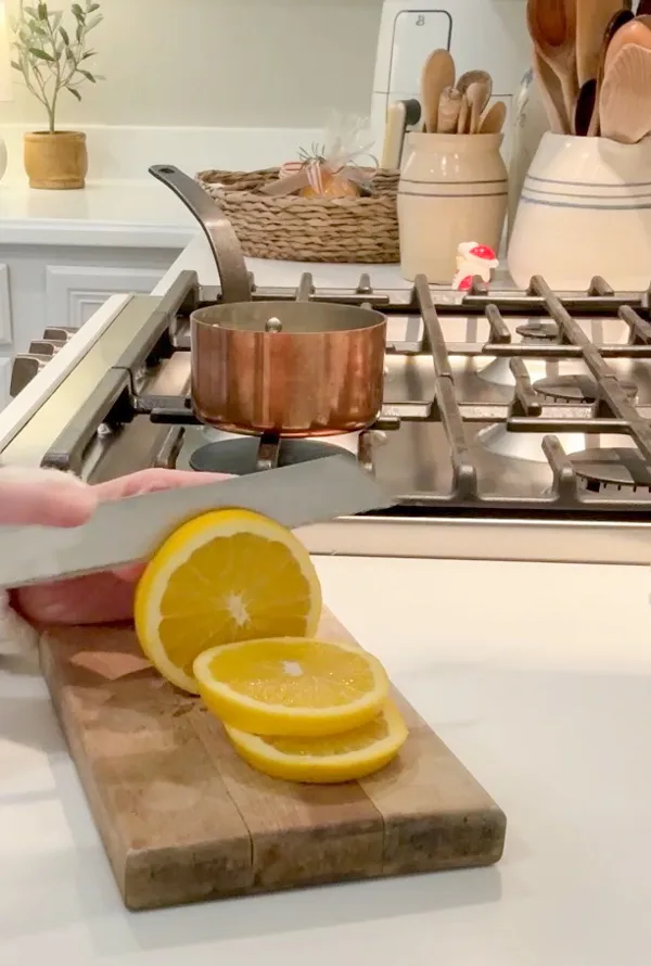 Cutting oranges for a Christmas simmer pot
