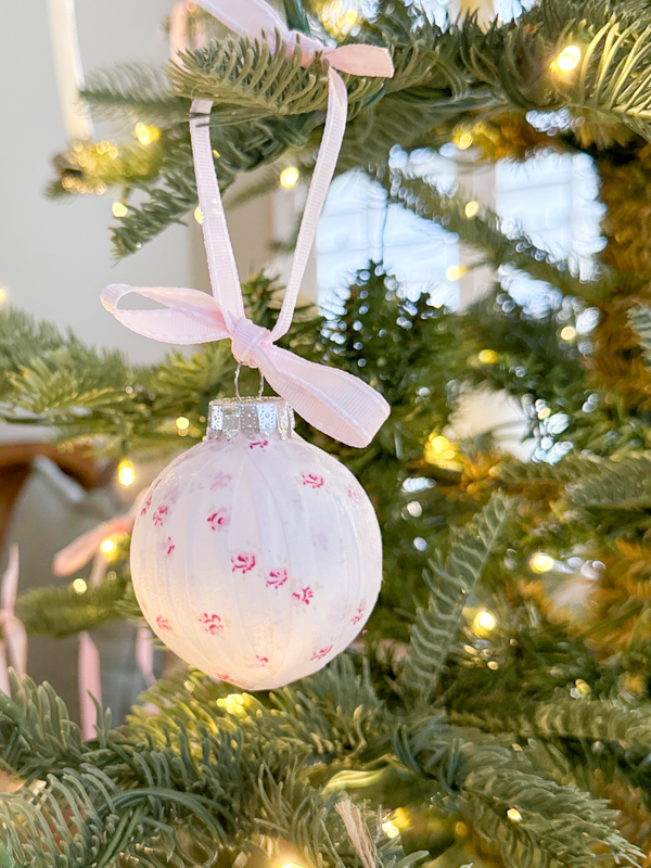 Decoupage fabric ornament on christmas tree