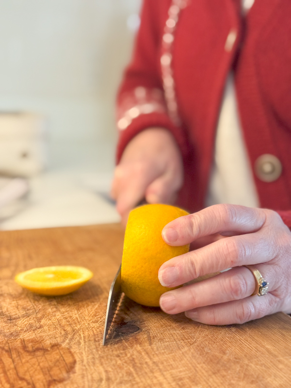 slice the ends off the orange