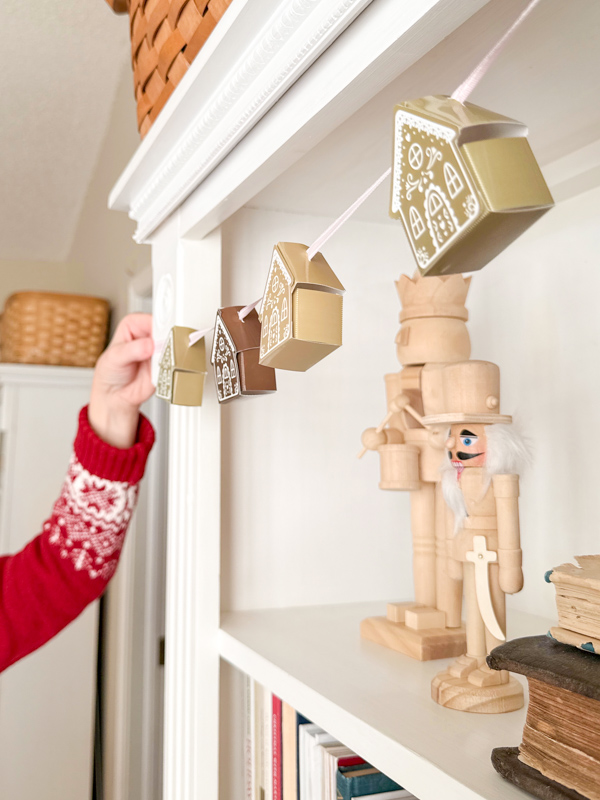 hang the gingerbread house garland