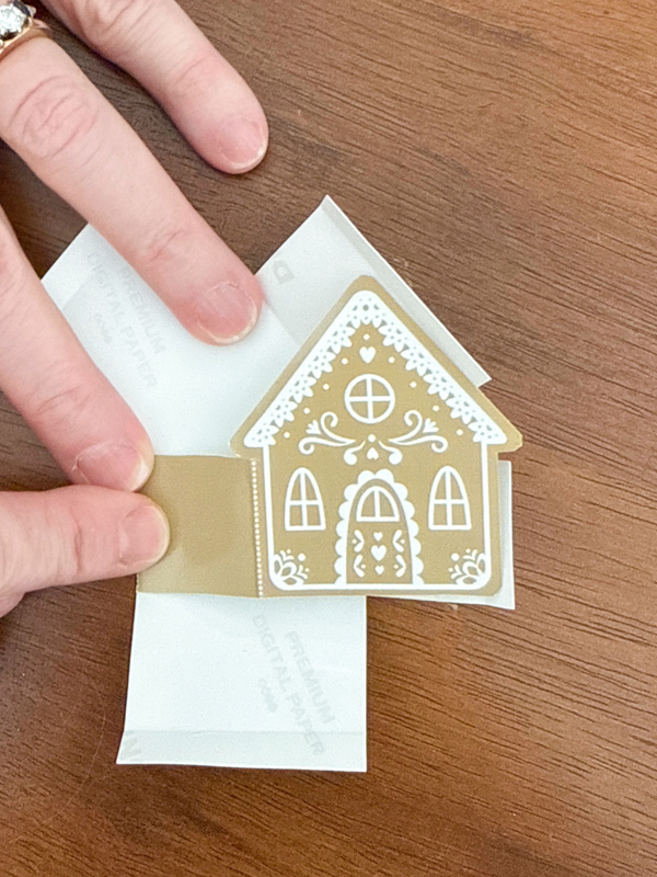 tape the sides of the gingerbread house together