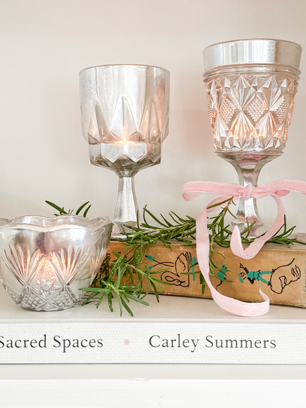 DIY mercury glass candle holder using thrift store glasses to craft beautiful distress silver finish on glasses.