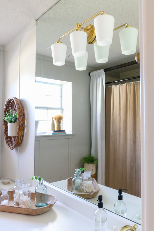 Champagne gold vanity light idea