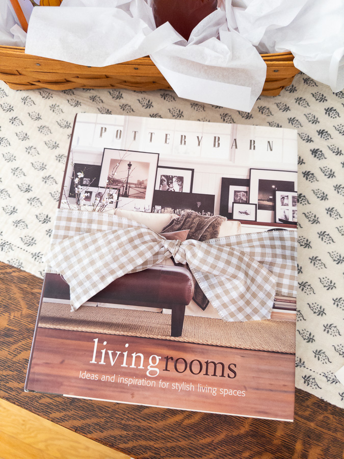 Stack of coffee table books tied with ribbon as a simple housewarming gift