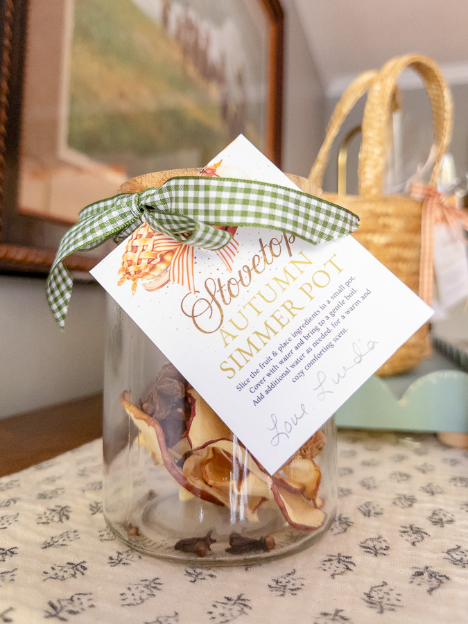 Mason jar simmer pot gift with orange slices, cranberries, and cinnamon sticks