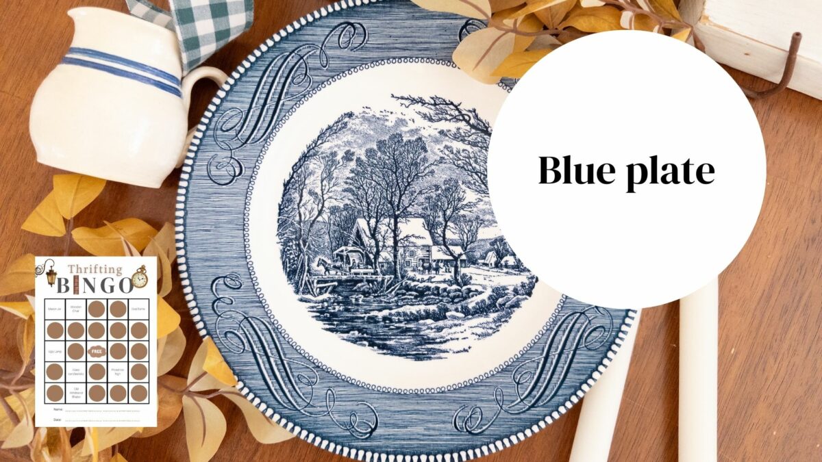 Blue and white currier and ives plate, candles, leaves, green and white gingham and a bingo card
