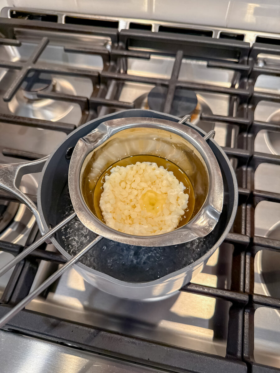Beeswax pellets melting in a double boilder