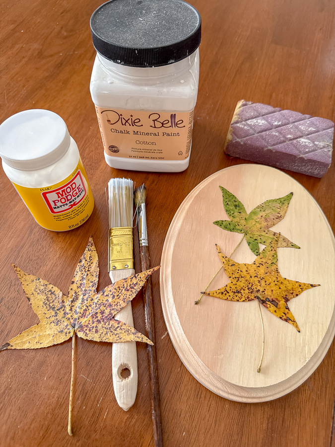 DIY preserving leaves with decoupage on wood.
