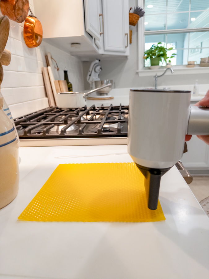 Heating beeswax with blow dryer