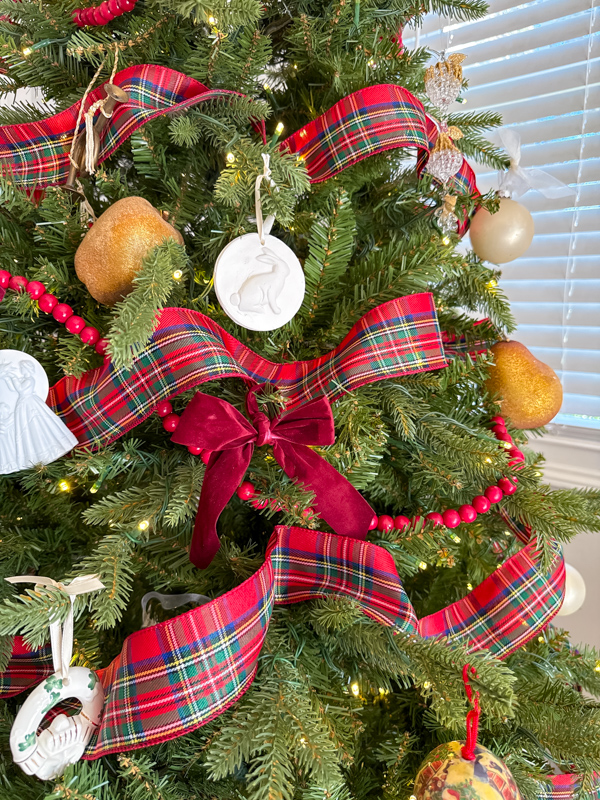Ralph Lauren themed Christmas tree with plaid ribbon, velvet bows and vintage decorations