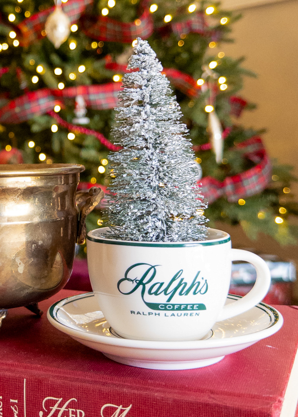Ralph's coffee mug by Ralph Lauren and bottome brush tree Christmas decorations inside
