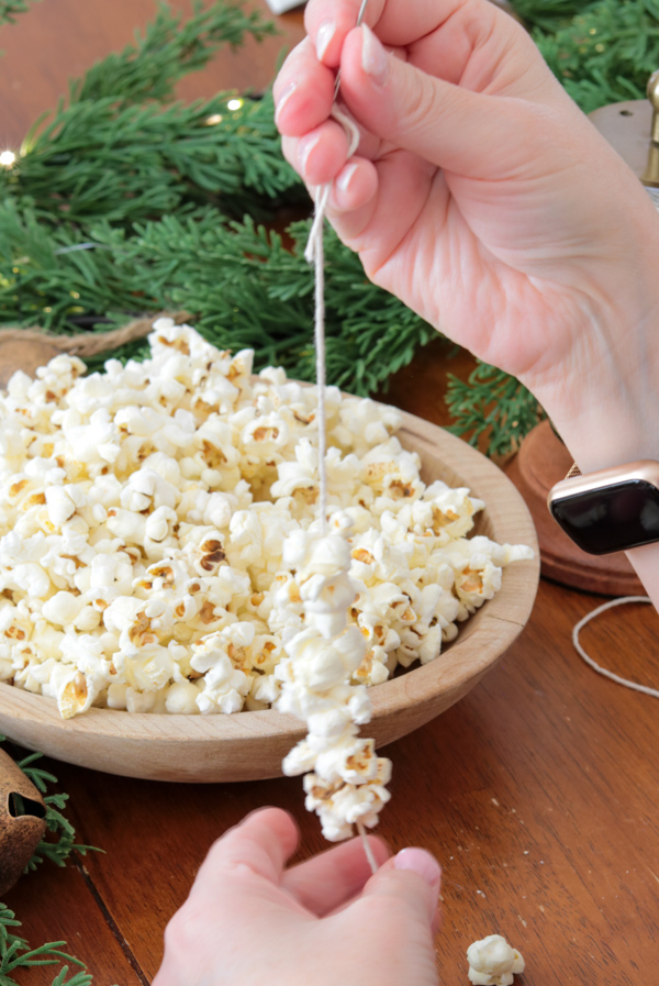 Twine with popcorn on it to make a popcorn garland