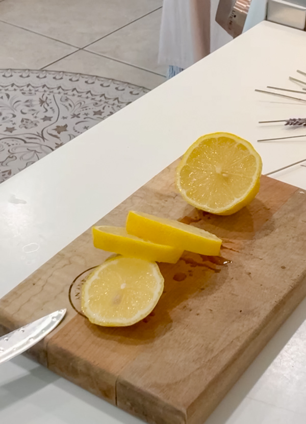 Slice lemons to make a spring simmer pot