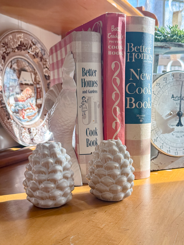 Hutch decorated for winter with pine cone salt and pepper shakers