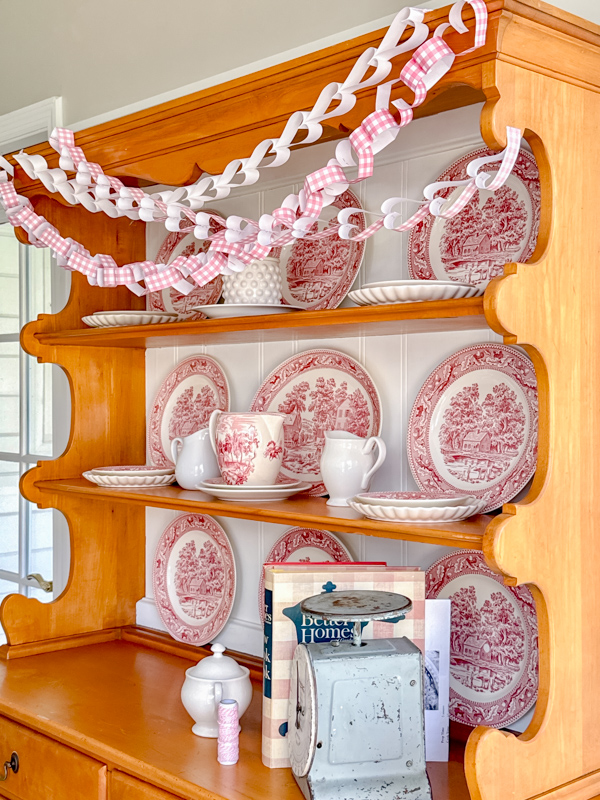 Kitchen Valentine decorations using pink and white paper heart chains