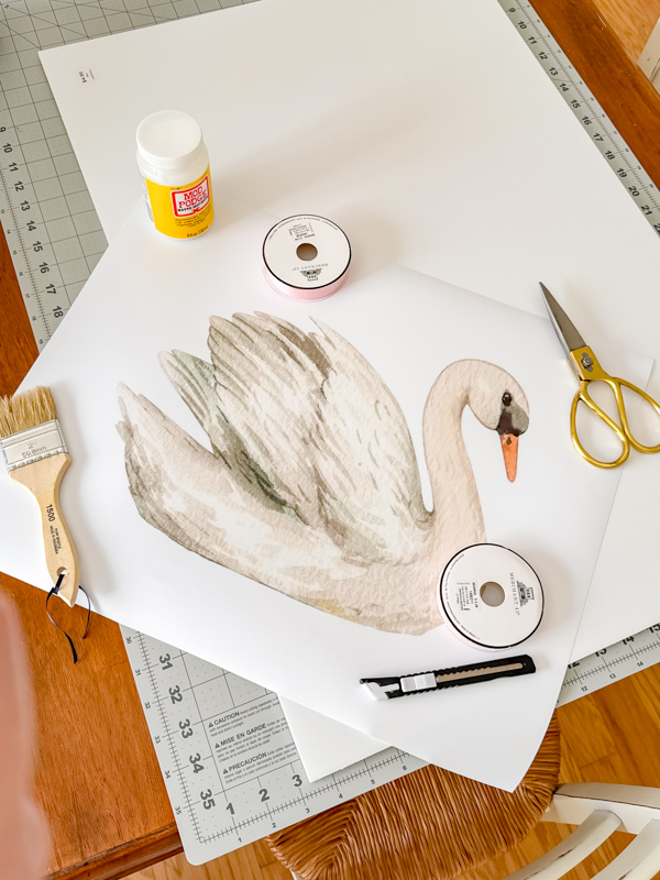 Supplies to make a swan wall decoration
