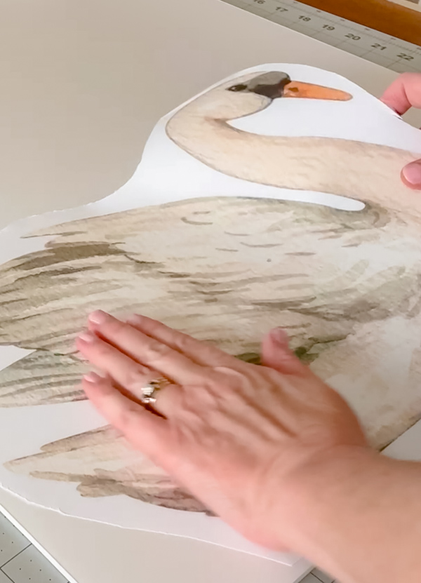 Apply swan printable to foam board