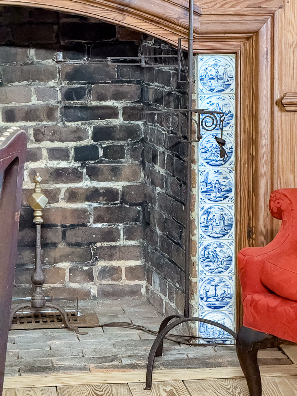 Delft tile design on the sides of this fireplace.
