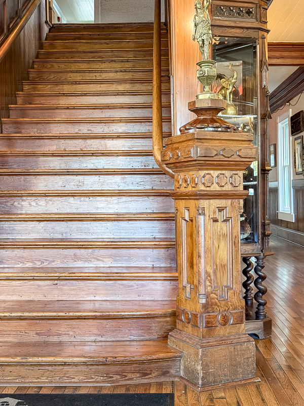 Ornate newell post design to steal for your new home at The Gibson Inn.