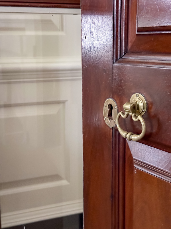 Brass pull and key hole from a door at The Governors Palace in Colonial Williamburg. Great idea to make a newer home look old.