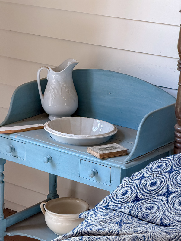 Antique washstand painted a soft dusty blue chalk paint