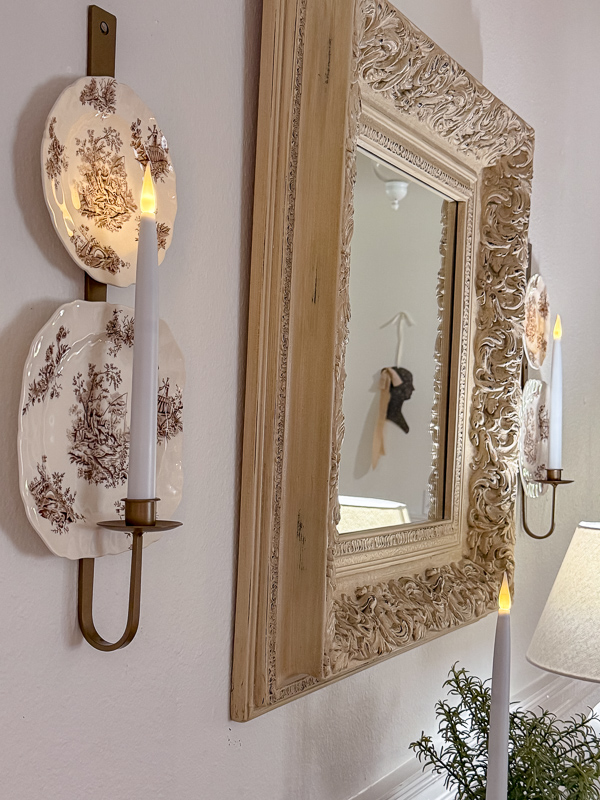 Old plates candle sconce.